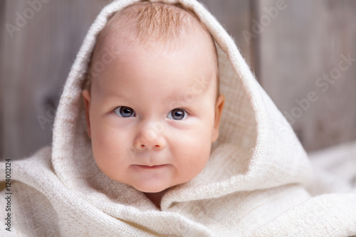"Beautiful newborn wrapped in a blanket" Stock photo and royalty-free