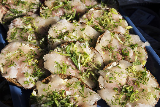fresh marinated herring fillet sandwiches with dill