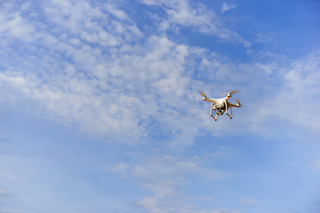 A flying drone armed with camera