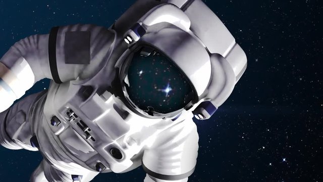 The astronaut in outer space against stars