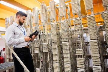 Technician using digital cable analyzer