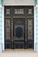 luxury old brown wooden door with ornaments in building