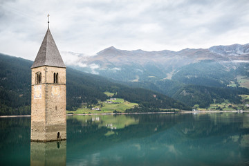 Church tower of Lago di Resia in Curon Venosta