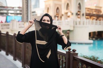 Face-covered Arabic woman.