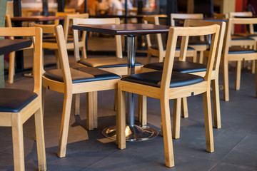 wooden chairs in cafe
