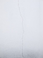 white wall with cracks