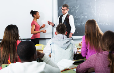 Students and teacher in class