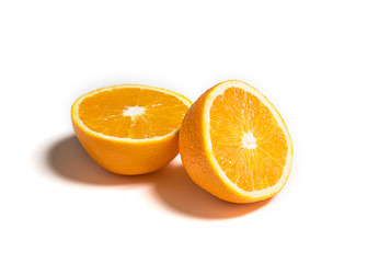 Sliced or cut orange isolated on white