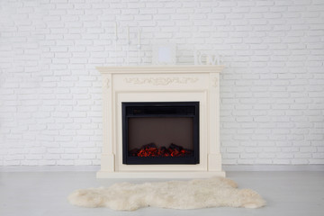 Decorative fireplace in an empty apartment