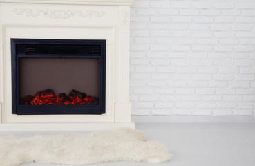 Decorative fireplace in an empty apartment
