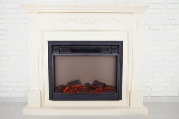 Decorative fireplace in an empty apartment