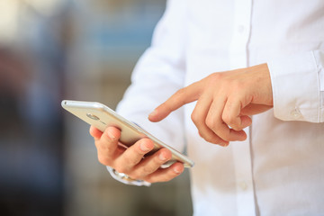 Businessman holding a smartphone