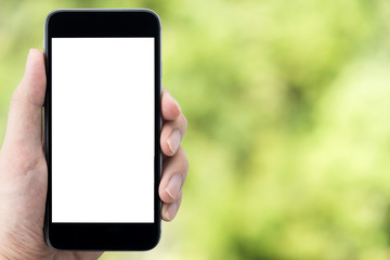 Man holding smartphone with blank mockup screen.