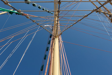Colorful mast and rigging of an old sailboat