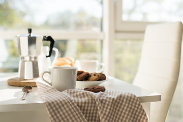 Early morning french home breakfast with coffee
