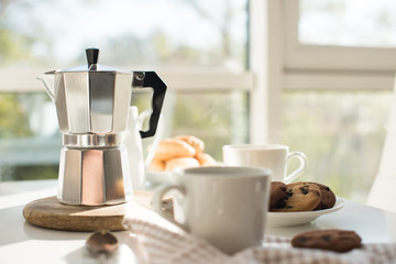 Early morning french home breakfast with coffee