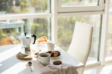 Early morning french home breakfast with coffee