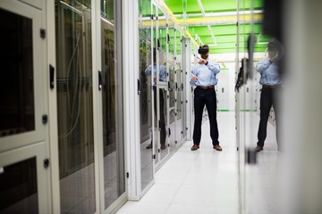 Technician using virtual reality headset
