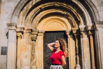 Young couple near old wooden door.
