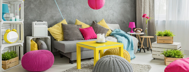 living room decorated with many colorful accessories