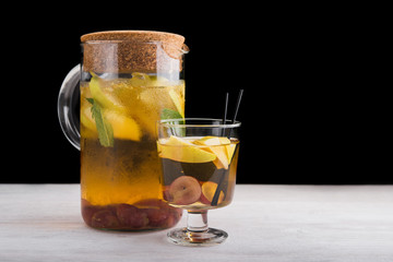 glass of apple cocktail beverage