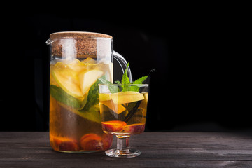 glass of apple cocktail beverage