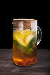 glass of apple cocktail beverage