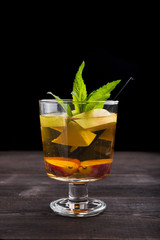 glass of apple cocktail beverage