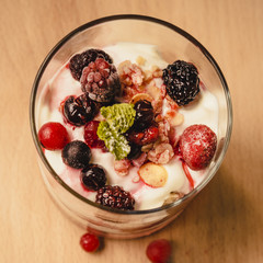 Greek yogurt with cereal and jam