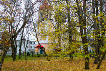 Church behind autumn trees