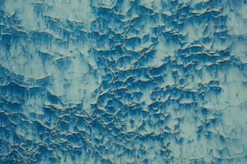 Blue cracked paint with a vintage and rustic look - obrazy, fototapety, plakaty