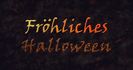 Frohliches Halloween text in German dissolving into dust to bottom.