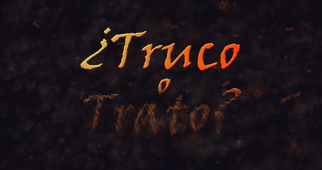Truco o Trato (Trick or Treat) Spanish text dissolving into dust from bottom
