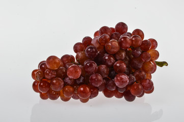 Bunch of red grapes isolated on white 