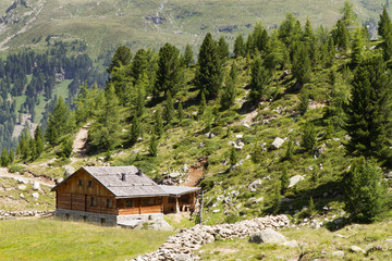 Fototapeta na wymiar Wooden Hut At Riva Di Turres On The Way To Kasseler Huette