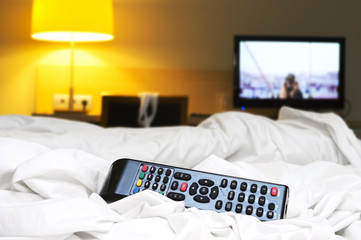 remote tv control on hotel bed  dangerous  for infection by bacteria