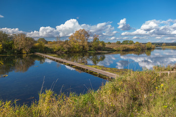 Wooden bridge across the river