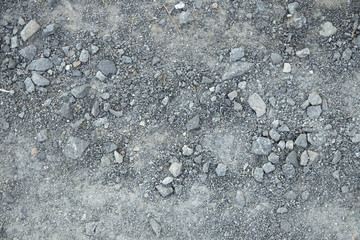 A whole page of grey gravel and dirt ground background texture 