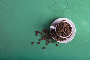Coffee cup on wooden background. Top view.
