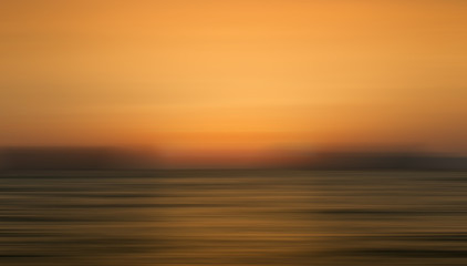 Obraz premium abstract motion of sunlight on the sea when sunset