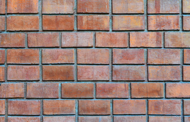 Obraz premium Grunge and pale orange brick wall