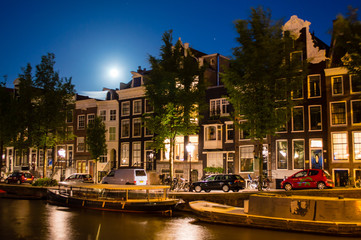 Naklejka premium Night street in Amsterdam, Netherlands