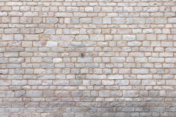 graue Wand aus Zigelsteinen gemauert