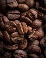 roasted coffee beans on dark background, can be used as a background