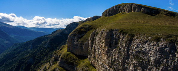 Panoramic view of the steep wall of rock