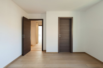 Interior, wide room with wooden floor