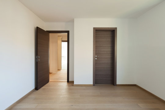 Interior, wide room with wooden floor