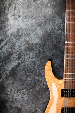 Electric guitar on grey background