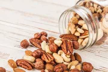 Mix of different nuts closeup photo