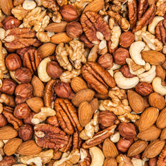 Mix of different nuts closeup photo